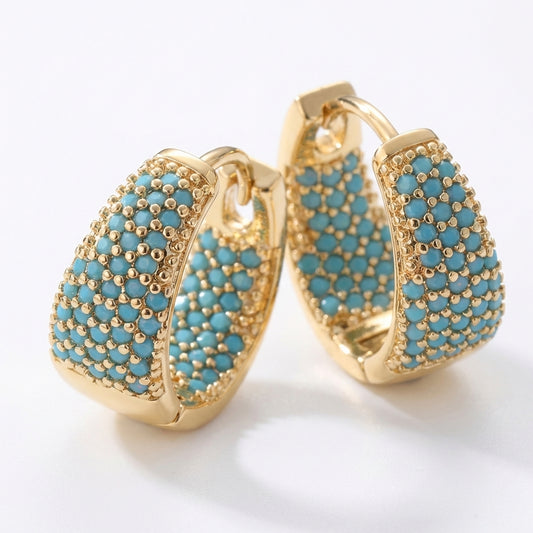 Orecchini a cerchio con perline turchesi color oro | Oro